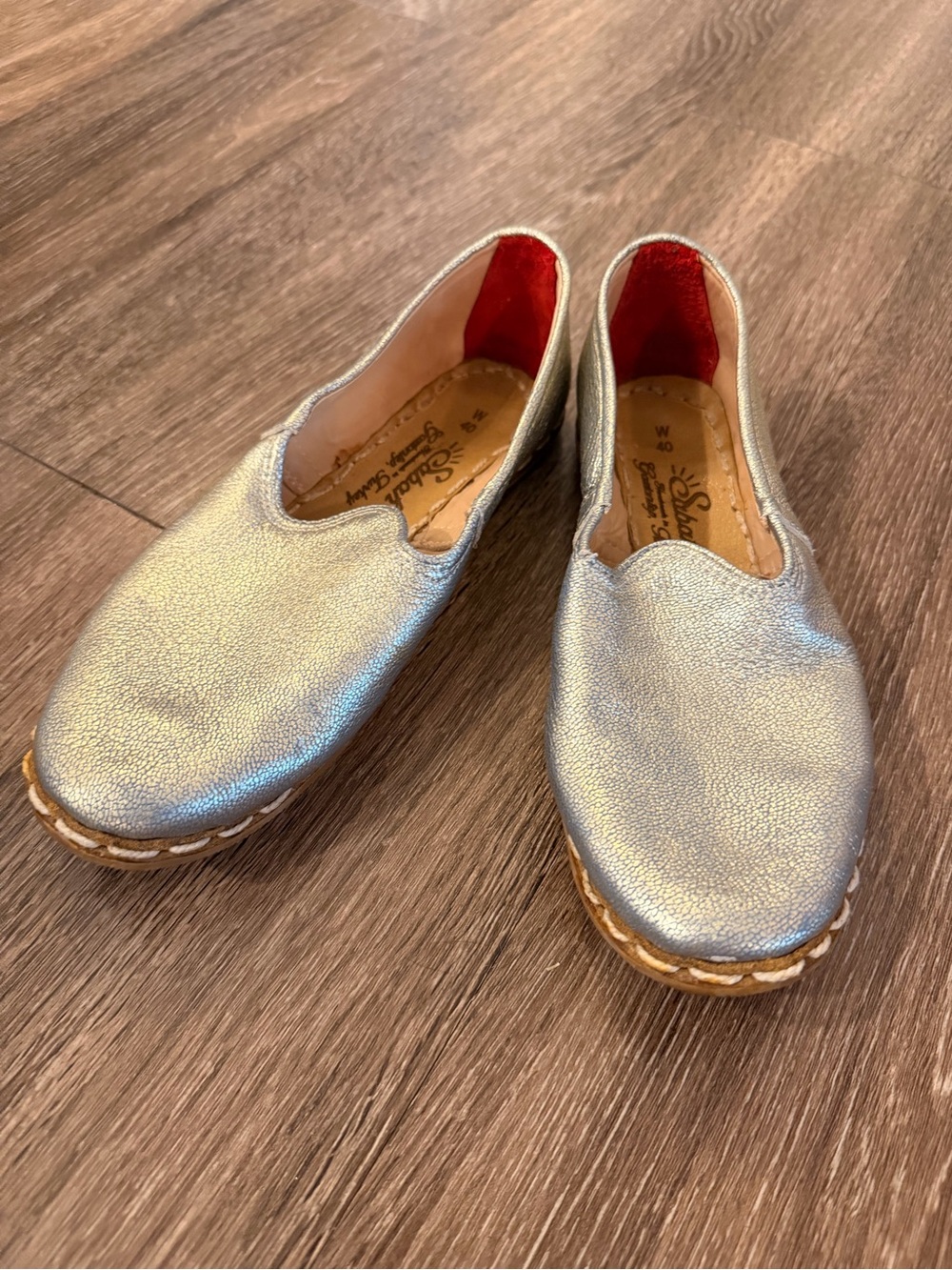 Sabah Metallic Silver Moccasins with Red Lining